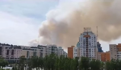 Астанчан попросили не выходить на улицу, закрыть окна и надевать маски